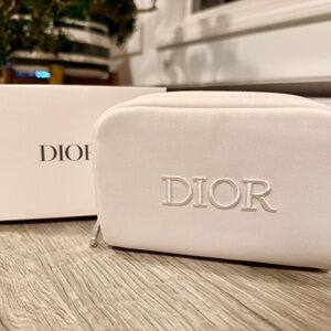 Dior white & silver velvet cosmetic pouch in original box. Zipper pull sealed.